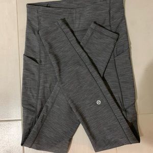 Lululemon leggings. Size 0. Dark grey with pockets on both sides.